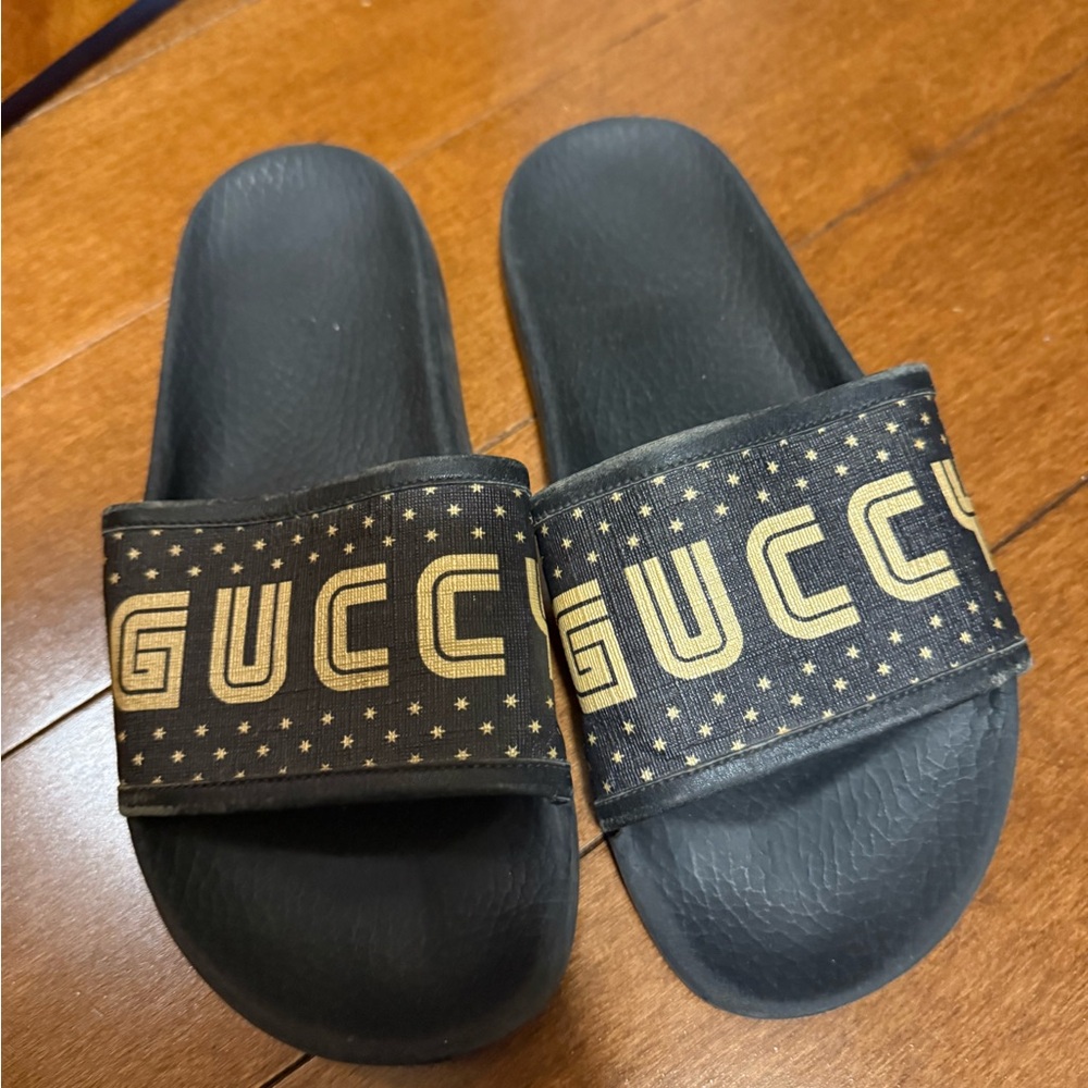 Gucci Black Slides with Gold Logo